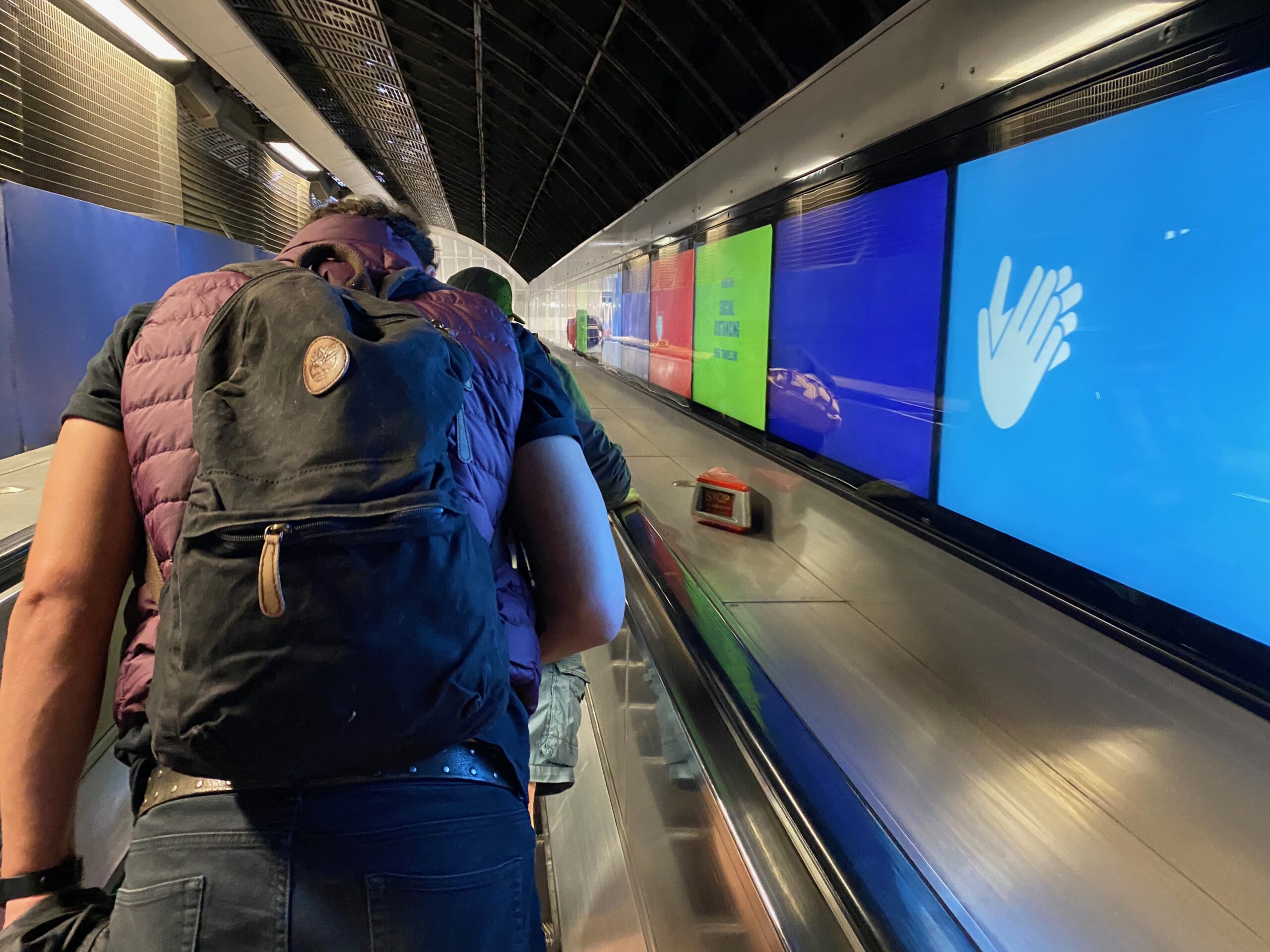 Passengers on escalator