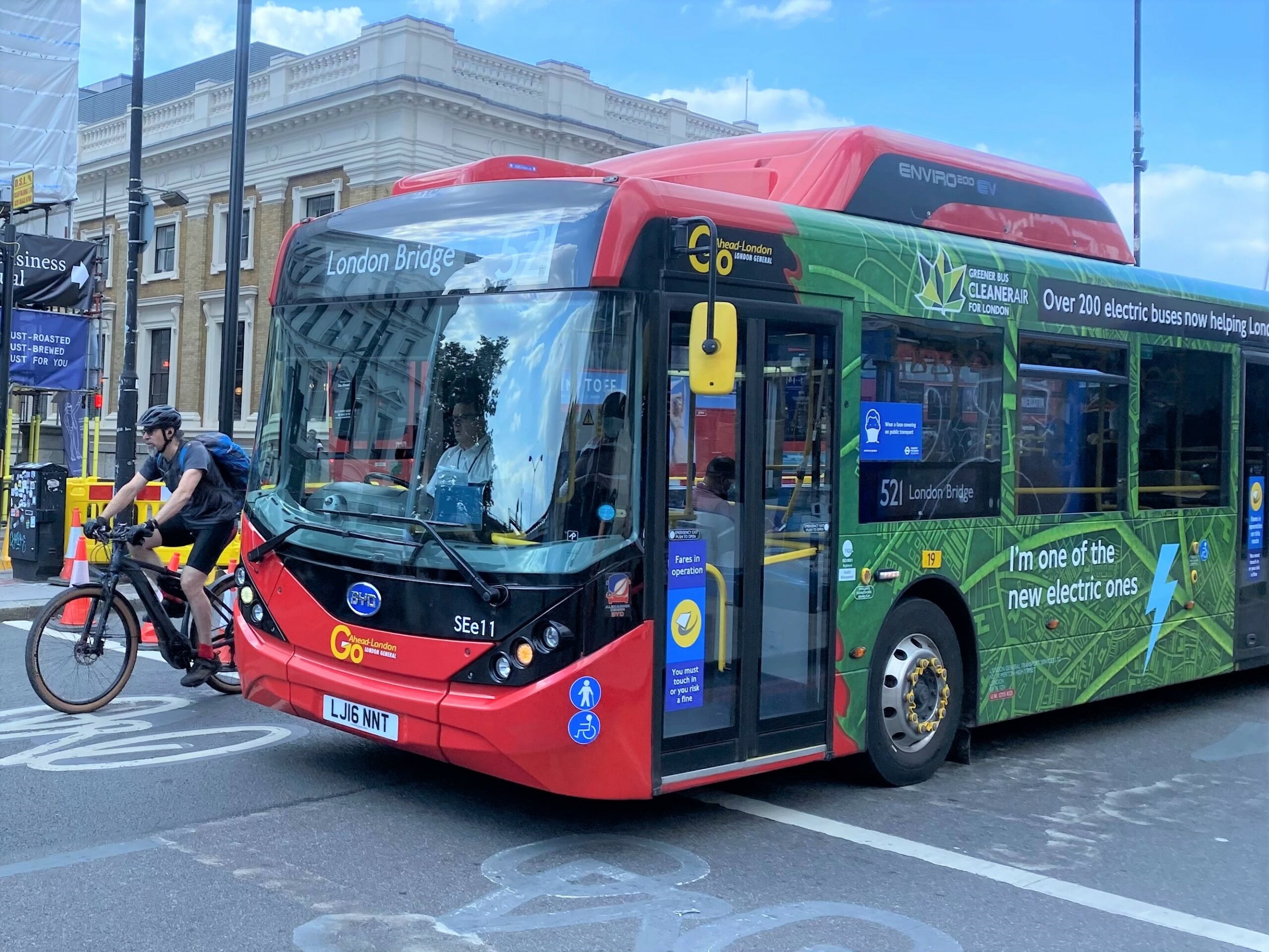 521 bus and cyclist