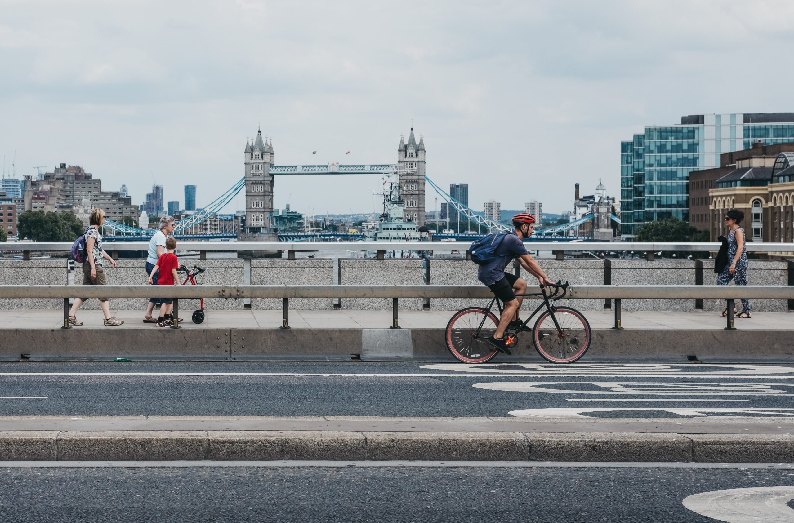 pedestrians, cyclist and Tower Bridge