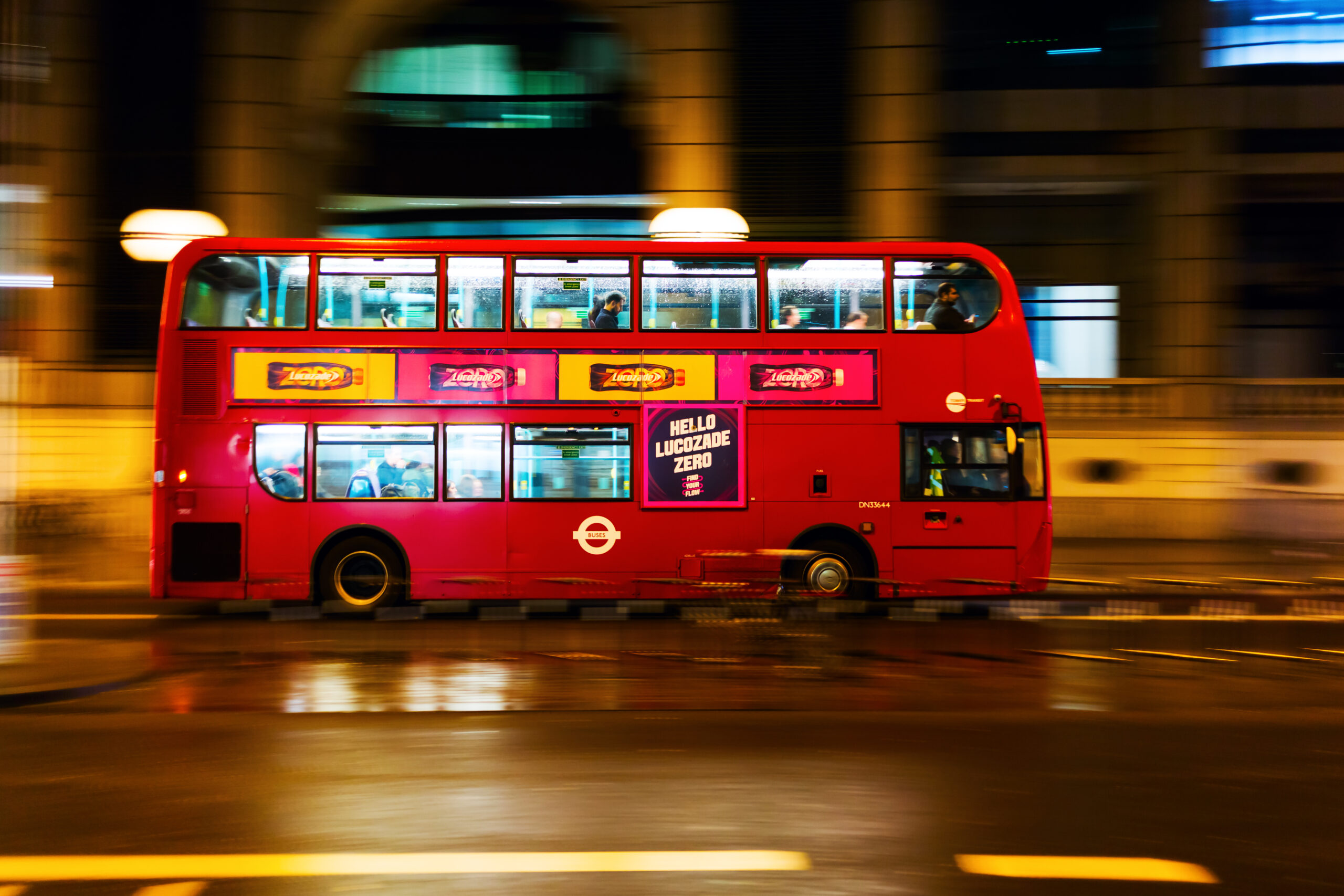 London bus travelling at night