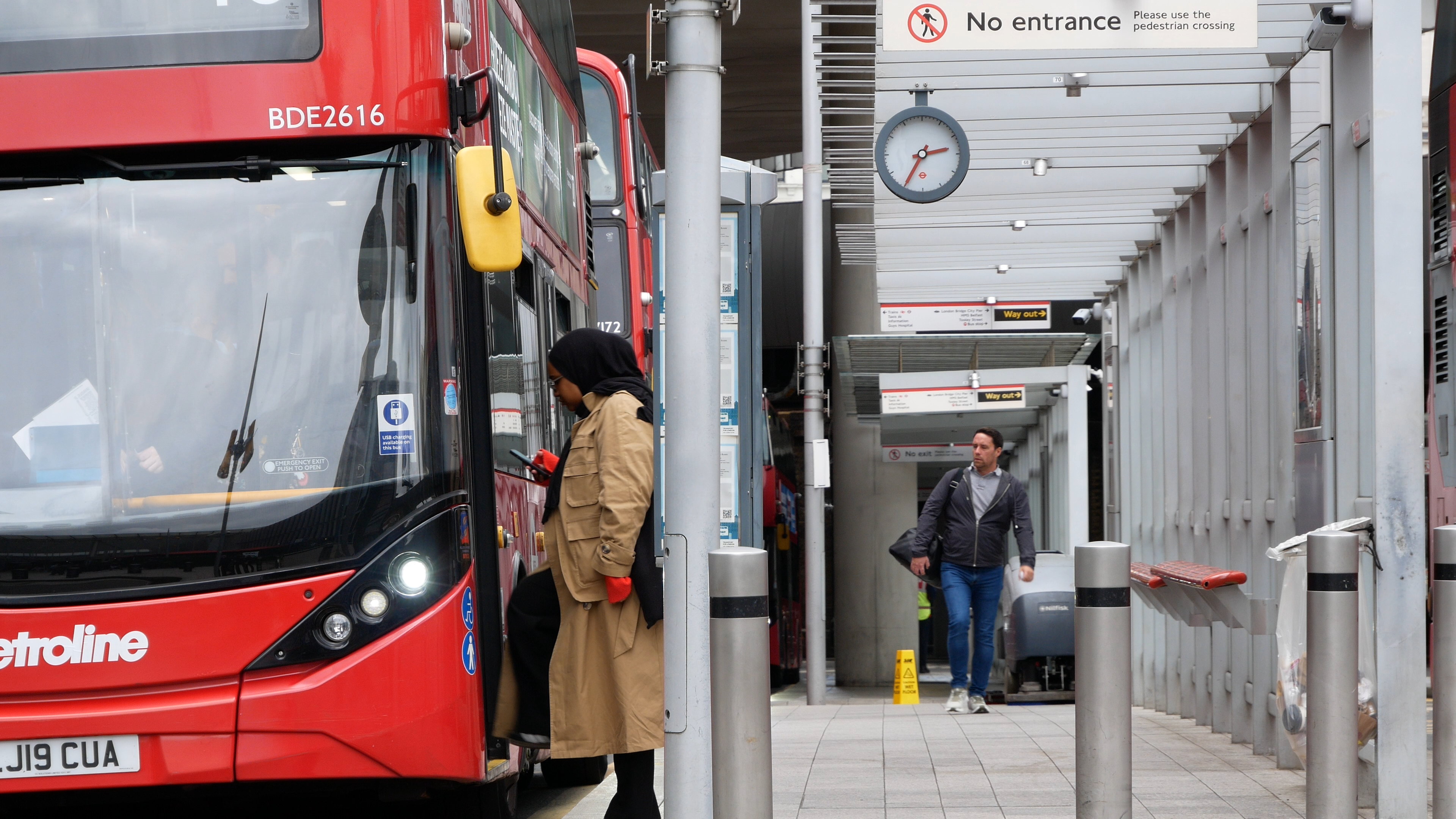 Woman boarding bus