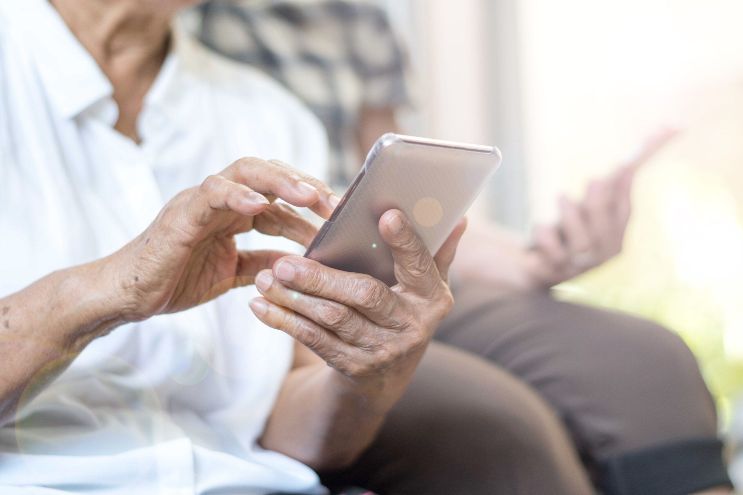 People's hands using smartphones