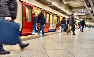 Passengers getting off the tube at Westminster station in central London