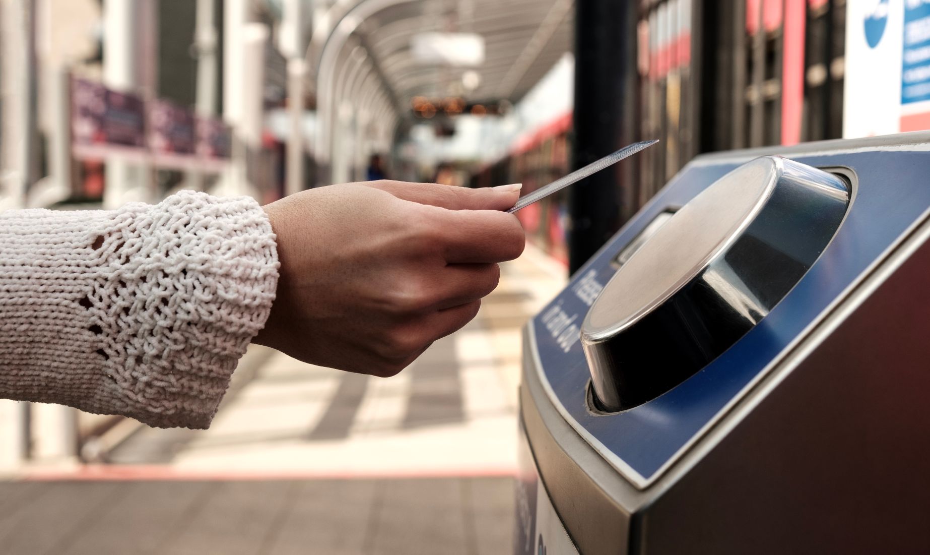 Hand tapping on station card reader