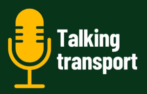The words Talking Transport in white on a dark green background with a yellow microphone