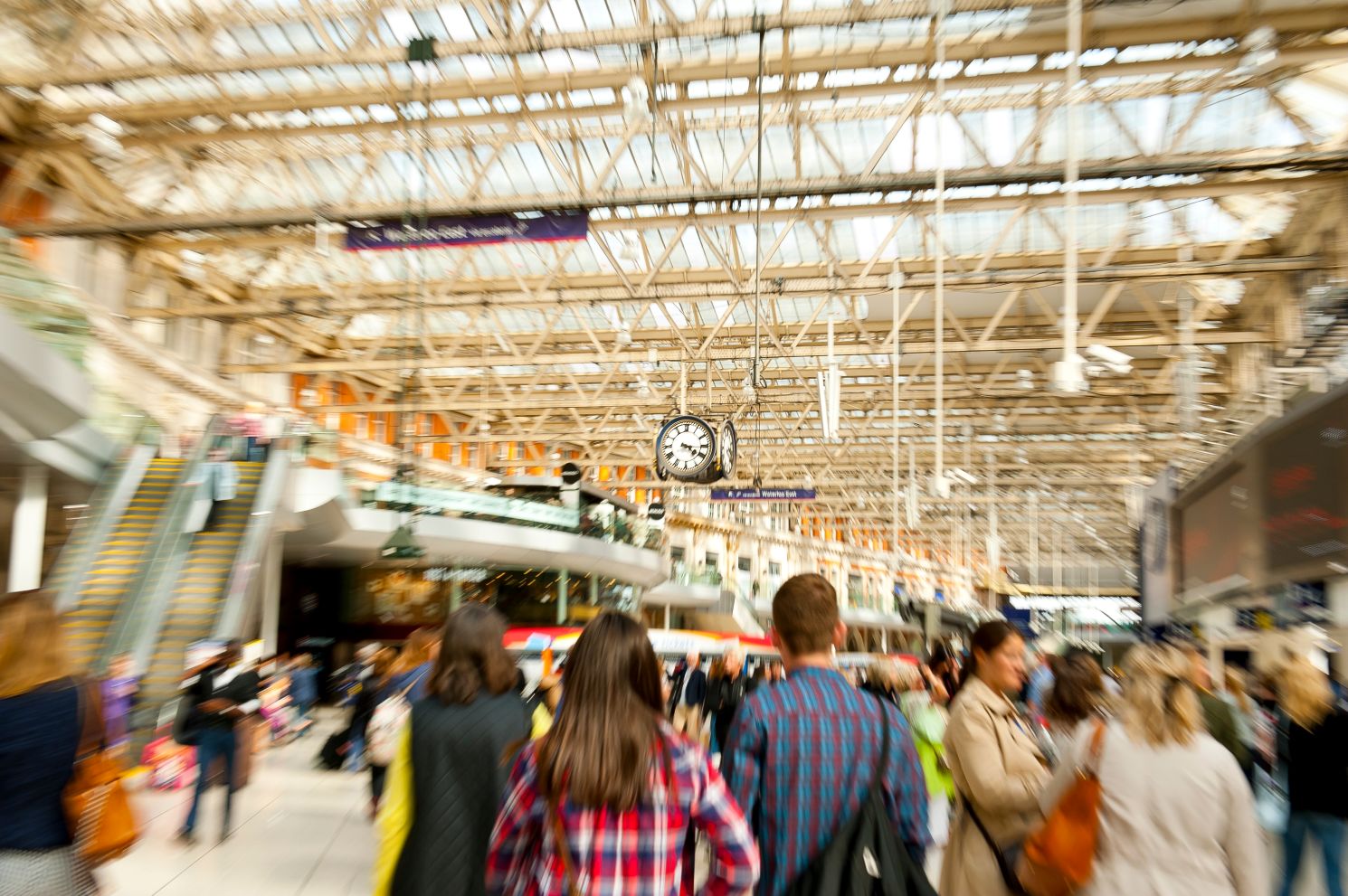 People inside Waterloo train station in London