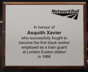 A plaque at Euston station which reads: In honour of Asquith Xavier who successfully fought to become the first black worker employed as a train guard at London Euston Station in 1966