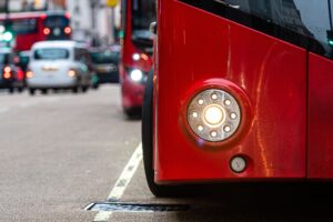 Close up of the front of a red London bus